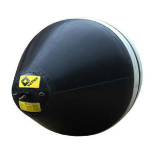 A black and white ball with a yellow sticker on it.